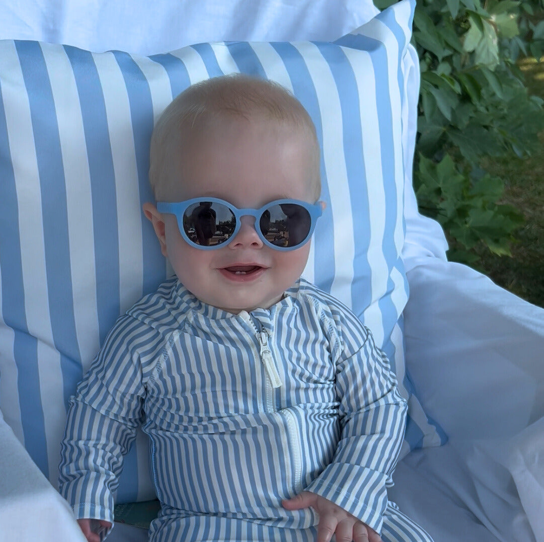 baby-sunglasses-being-worn-by-a-blonde-haired-infant