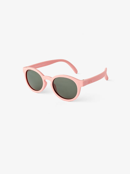 Round pink baby sunglasses by Petit Peepers