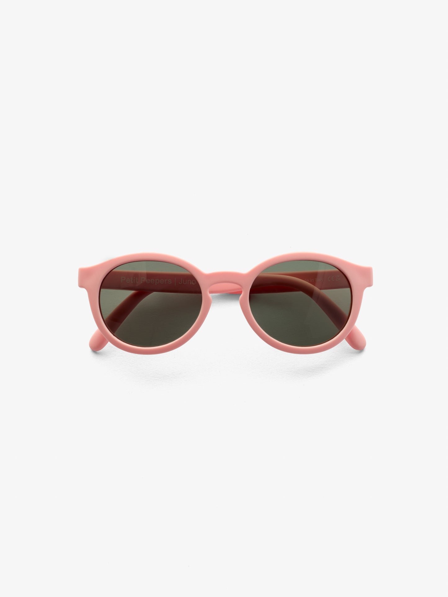 Folded pair of pink round baby sunglasses