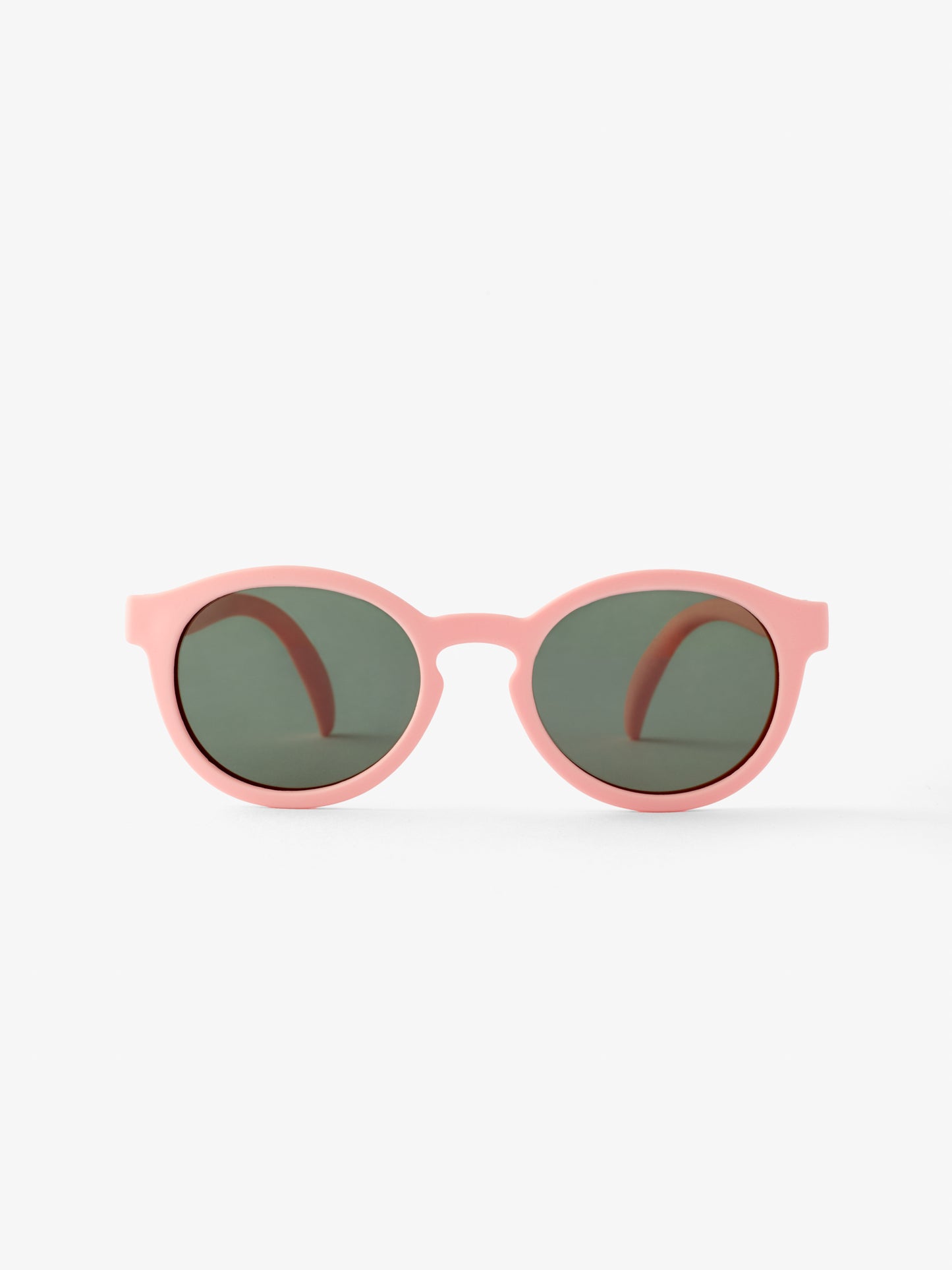 Front view of pair of round pink baby sunglasses by Petit Peepers