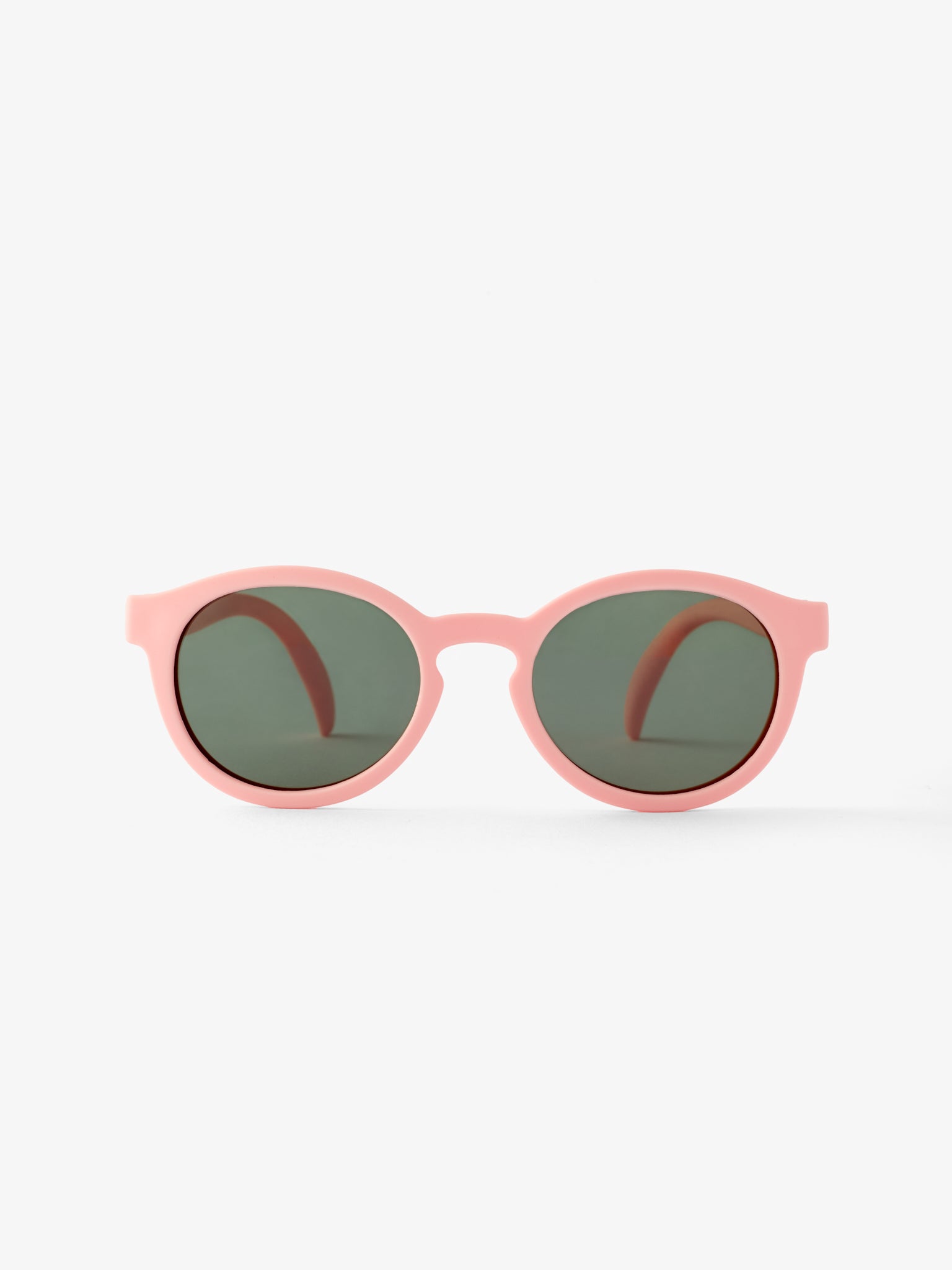 Front view of pair of round pink baby sunglasses by Petit Peepers