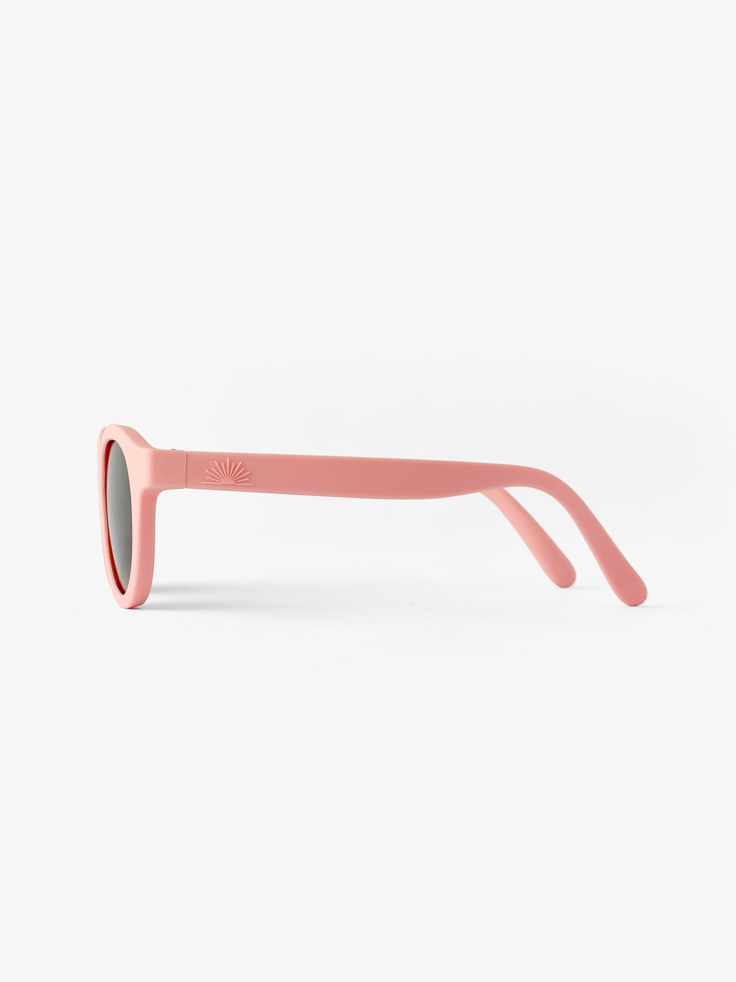 Side view of a pair of pink baby sunglasses
